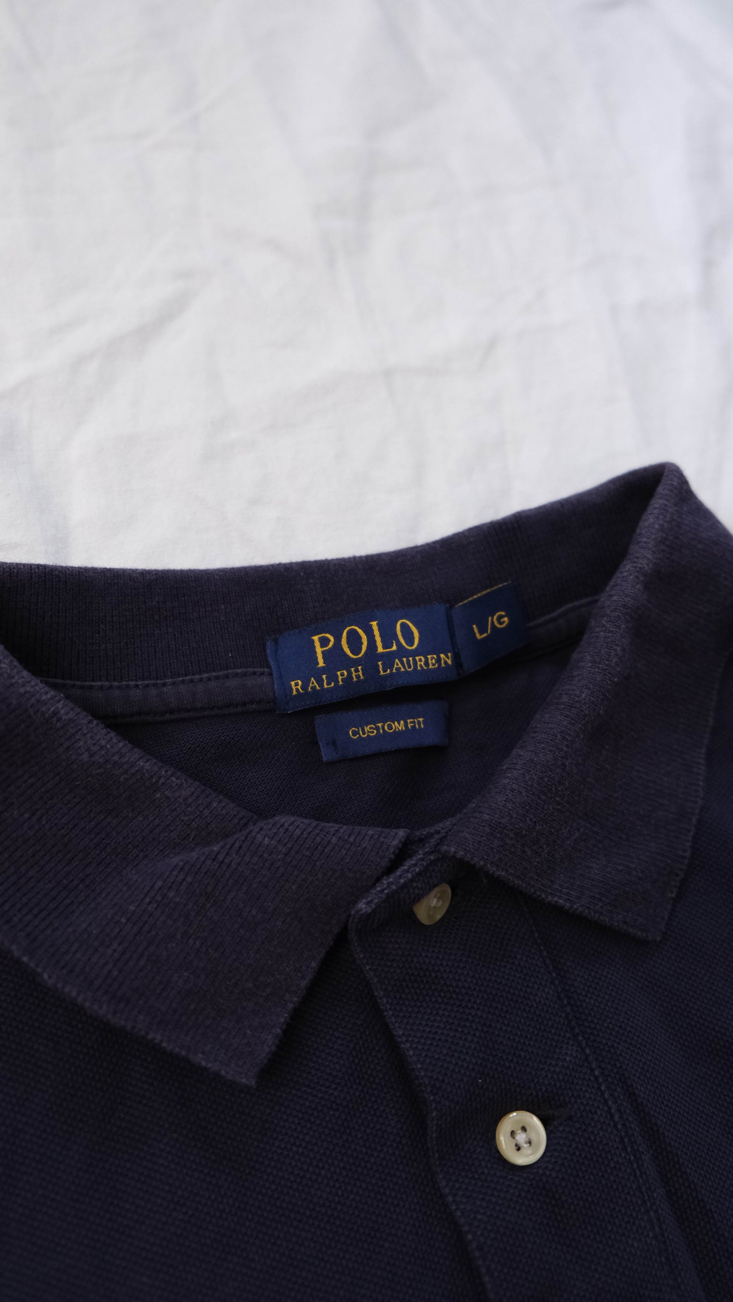 Ralph Lauren Polo (L)